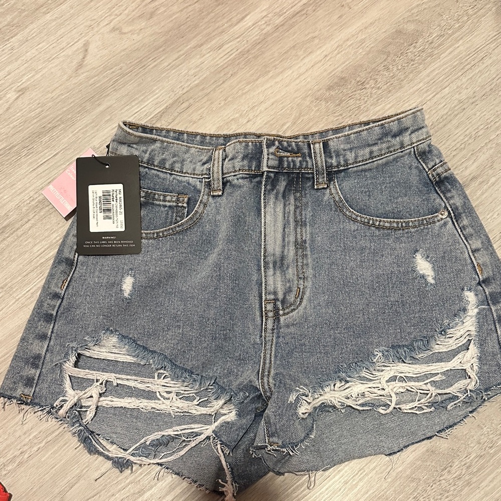 PrettyLittleThing Light Blue Distressed Denim Shorts